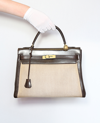 Kelly 32 Box/ Toile Leather in Ebène/ Natural, front view